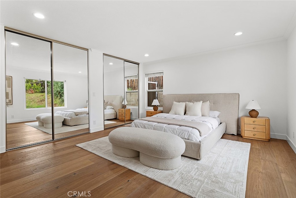 2162 Montgomery Road Thousand Oaks, CA 91360 - Photo 9 of 26 a spacious bedroom with a bed and wooden floor