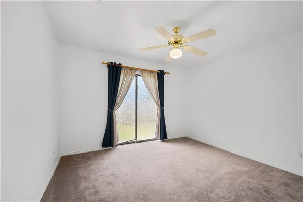 a bed room with a bed and a chandelier