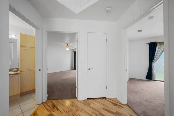 a bathroom with a sink a vanity and a mirror