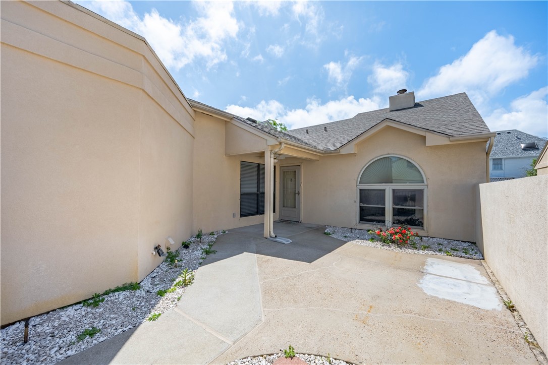 135 Santa Fe Rockport, TX 78382 - Photo 4 of 38 a view of a house with yard and seating space