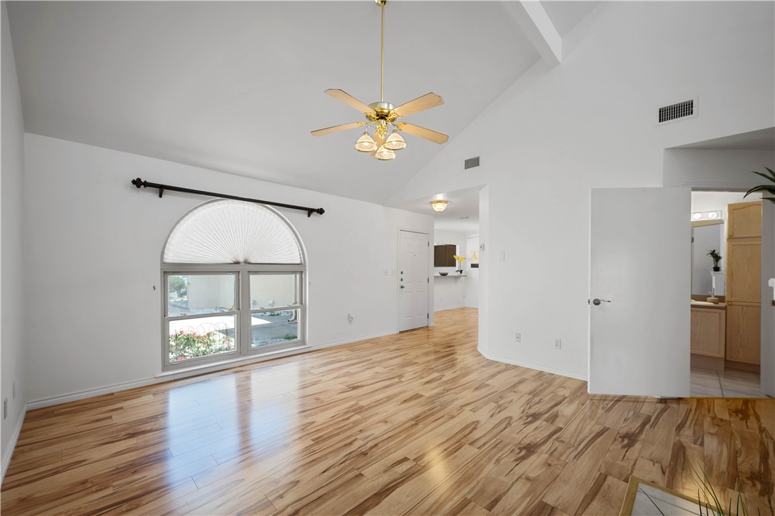 135 Santa Fe Rockport, TX 78382 - Photo 10 of 38 a view of empty room with wooden floor and fan