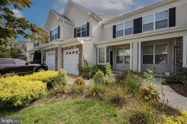front view of a building with a yard