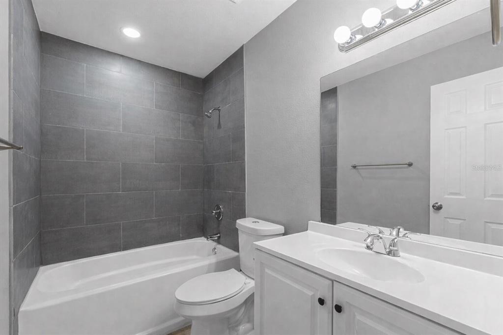 1000 Transmitter Road Panama City, FL 32401 - Photo 6 of 6 a bathroom with a sink a toilet and shower