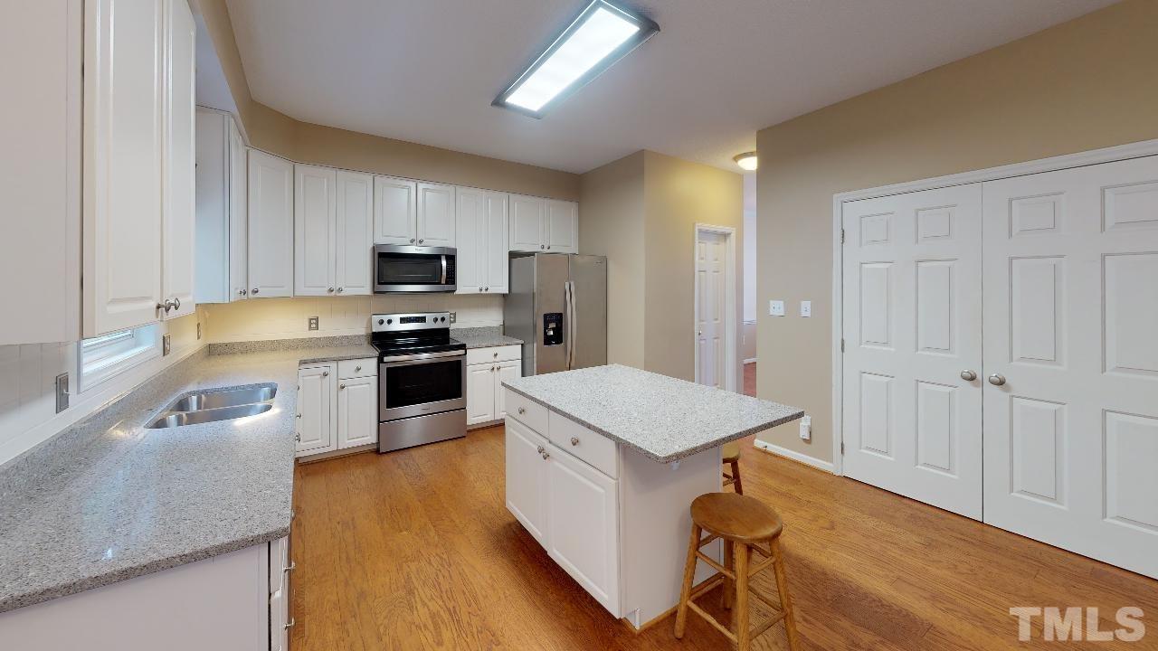 8211 Gresham Trace Lane Raleigh, NC 27615 - Photo 7 of 27