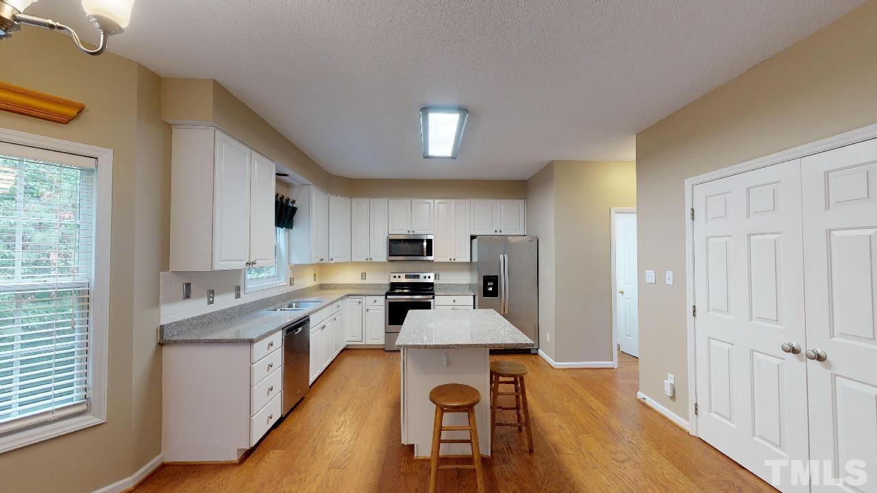 8211 Gresham Trace Lane Raleigh, NC 27615 - Photo 8 of 27