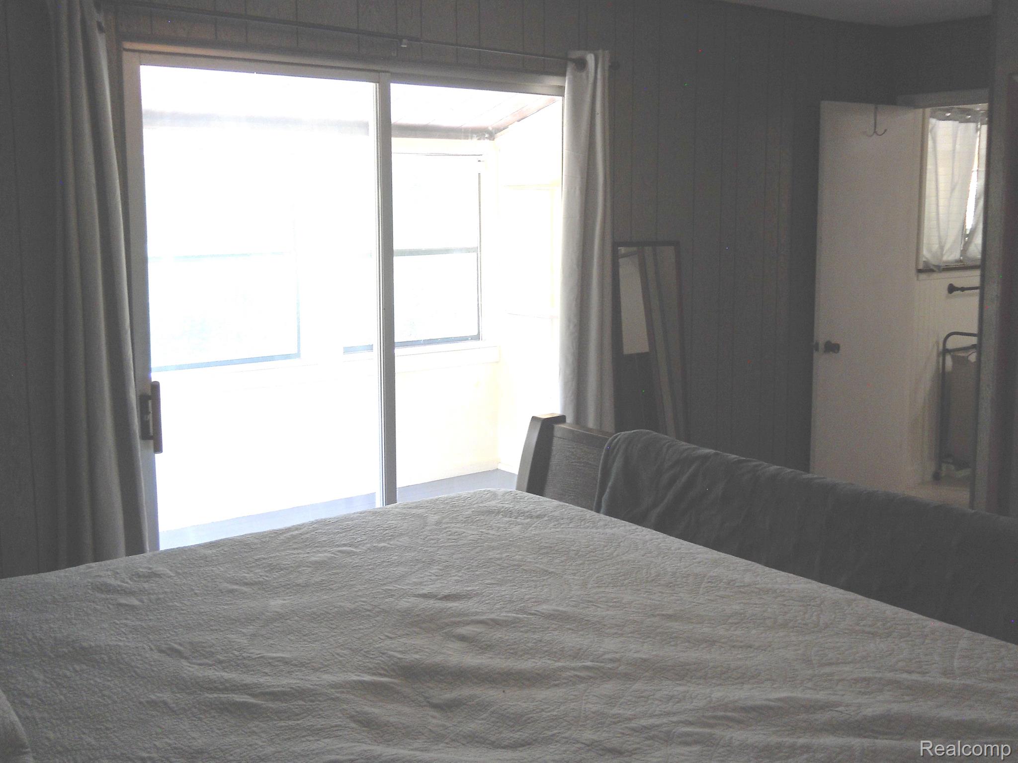 2829 East Schafer Road Howell, MI 48843 - Photo 11 of 38 master bed w/doorwall to private enclosed balcony