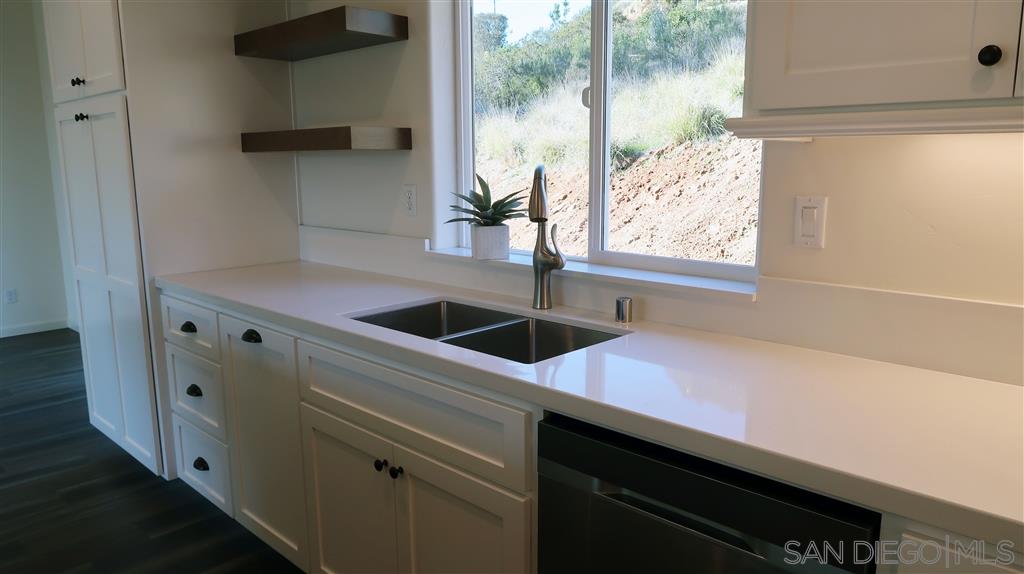 1424 Mountain View Road El Cajon, CA 92021 - Photo 5 of 17 Beautiful quartz countertops and tons of storage