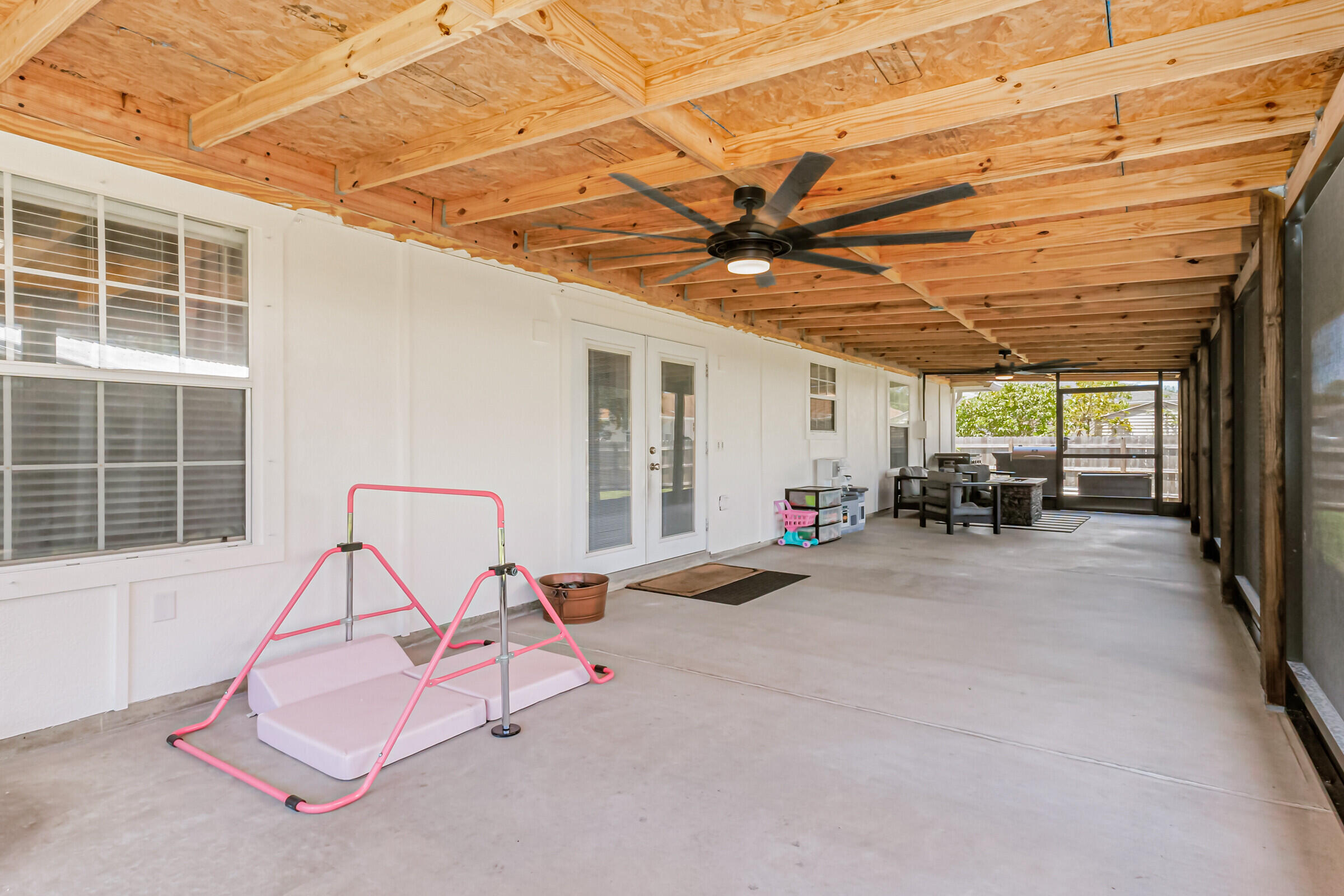 1030 San Rafael Road Southwest Palm Bay, FL 32908 - Photo 23 of 37 a view of a patio with table and chairs