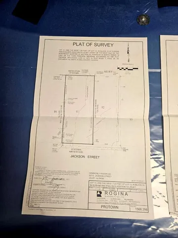 view of a refrigerator with wooden floor