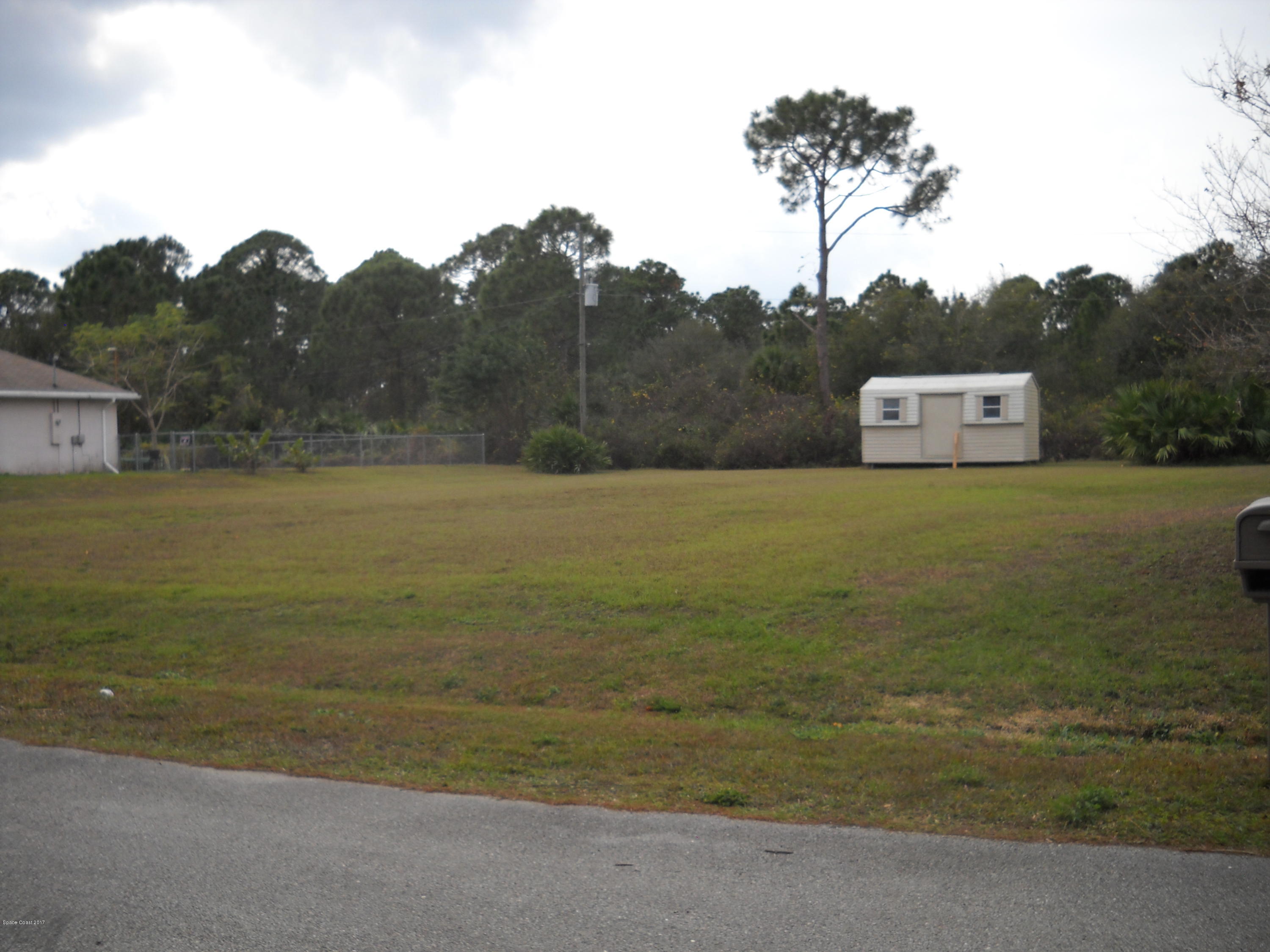 109 Tudor Road Southwest Palm Bay, FL 32908 - Photo 2 of 15 a view of a field with an ocean view