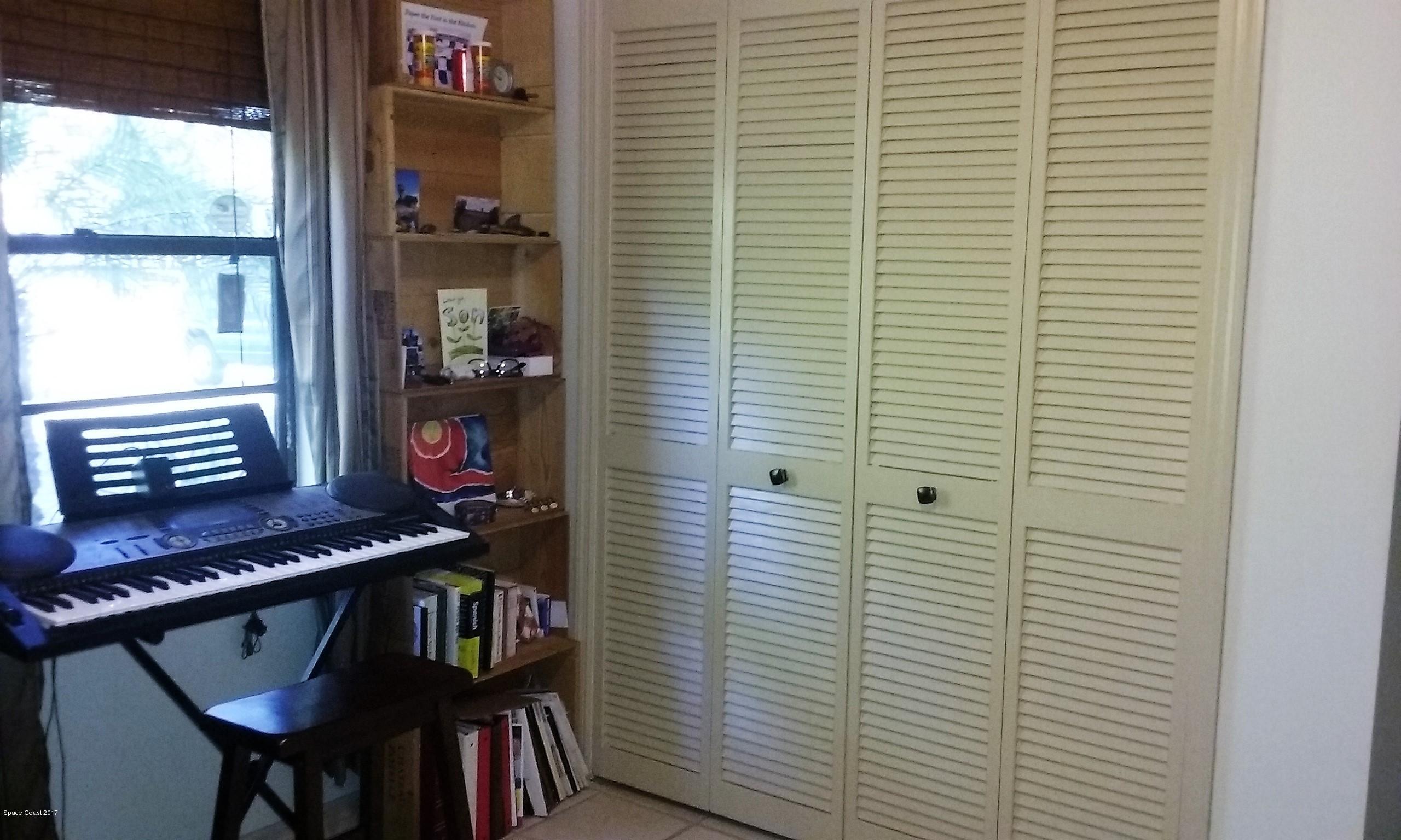 109 Tudor Road Southwest Palm Bay, FL 32908 - Photo 6 of 15 a view of a room with furniture