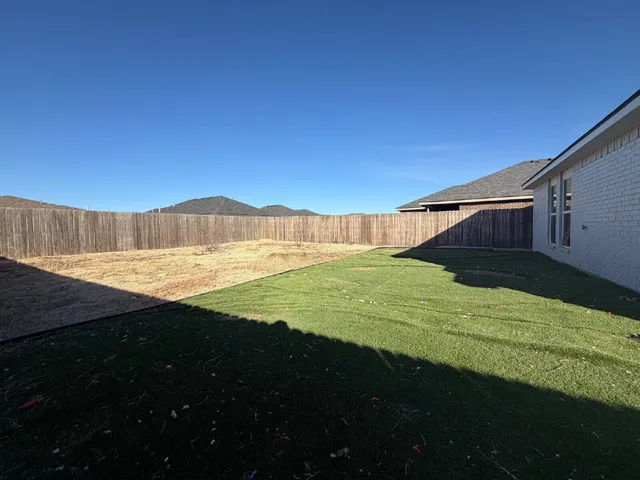 a view of an outdoor space and a yard
