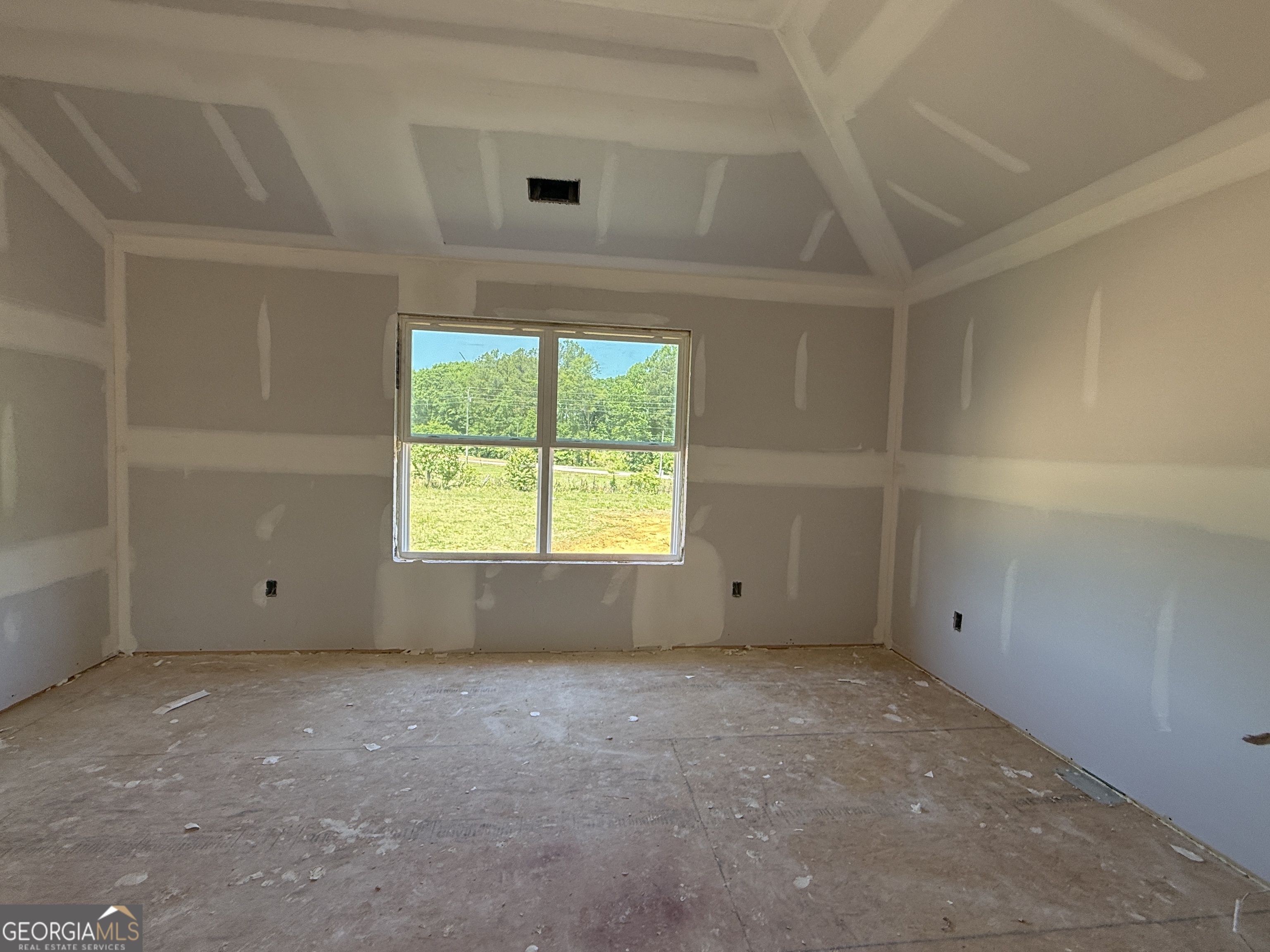 10 Rex Road Williamson, GA 30292 - Photo 22 of 63 an empty room with a window