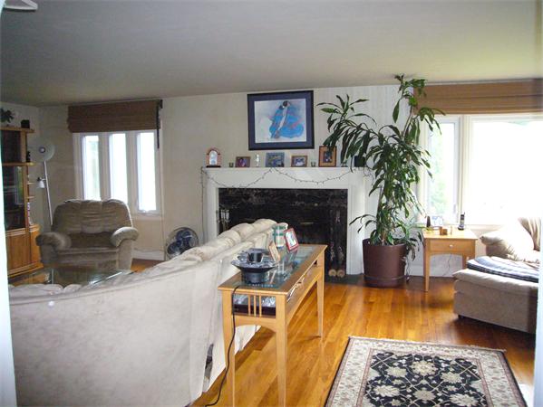 7 Zenith Drive Worcester, MA 01602 - Photo 10 of 13 a living room with furniture and a fireplace