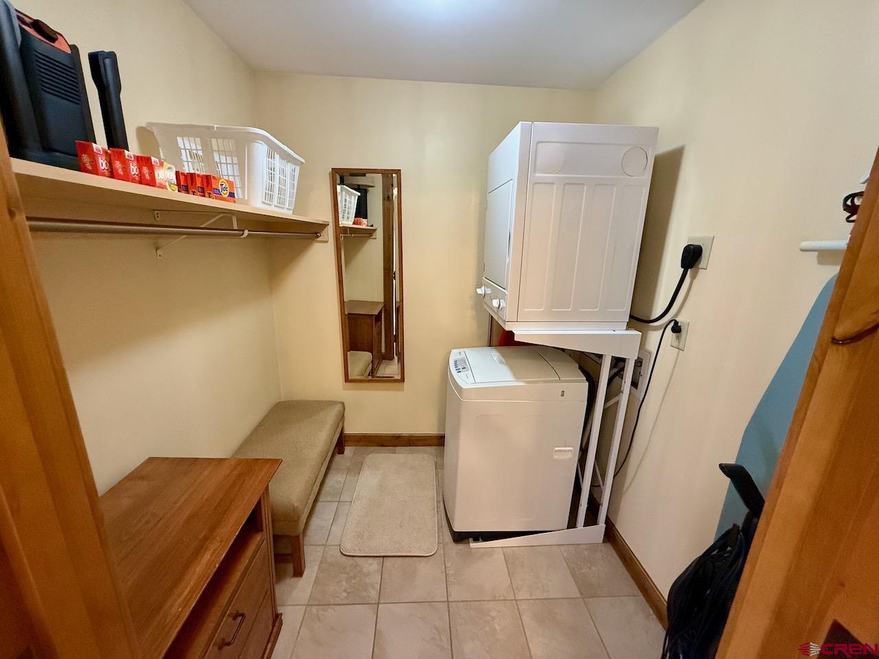 620 Gothic Road, Unit 206 Crested Butte, CO 81225 - Photo 18 of 41 a utility room with dryer and washer
