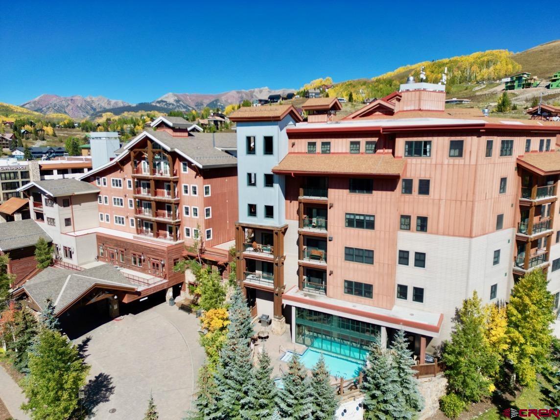 620 Gothic Road, Unit 206 Crested Butte, CO 81225 - Photo 2 of 41 front view of a building with a street