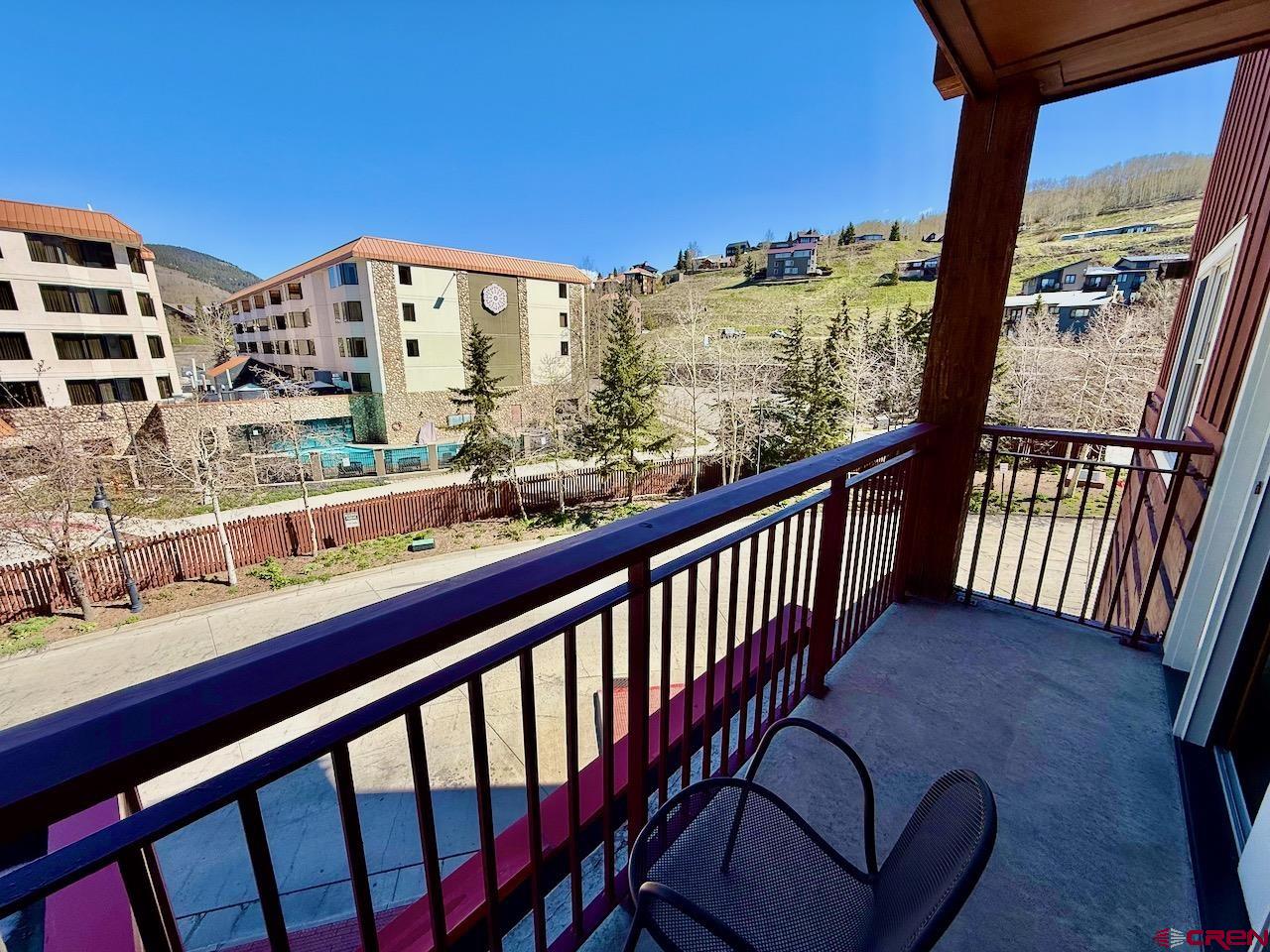 620 Gothic Road, Unit 206 Crested Butte, CO 81225 - Photo 23 of 41 a city view from balcony