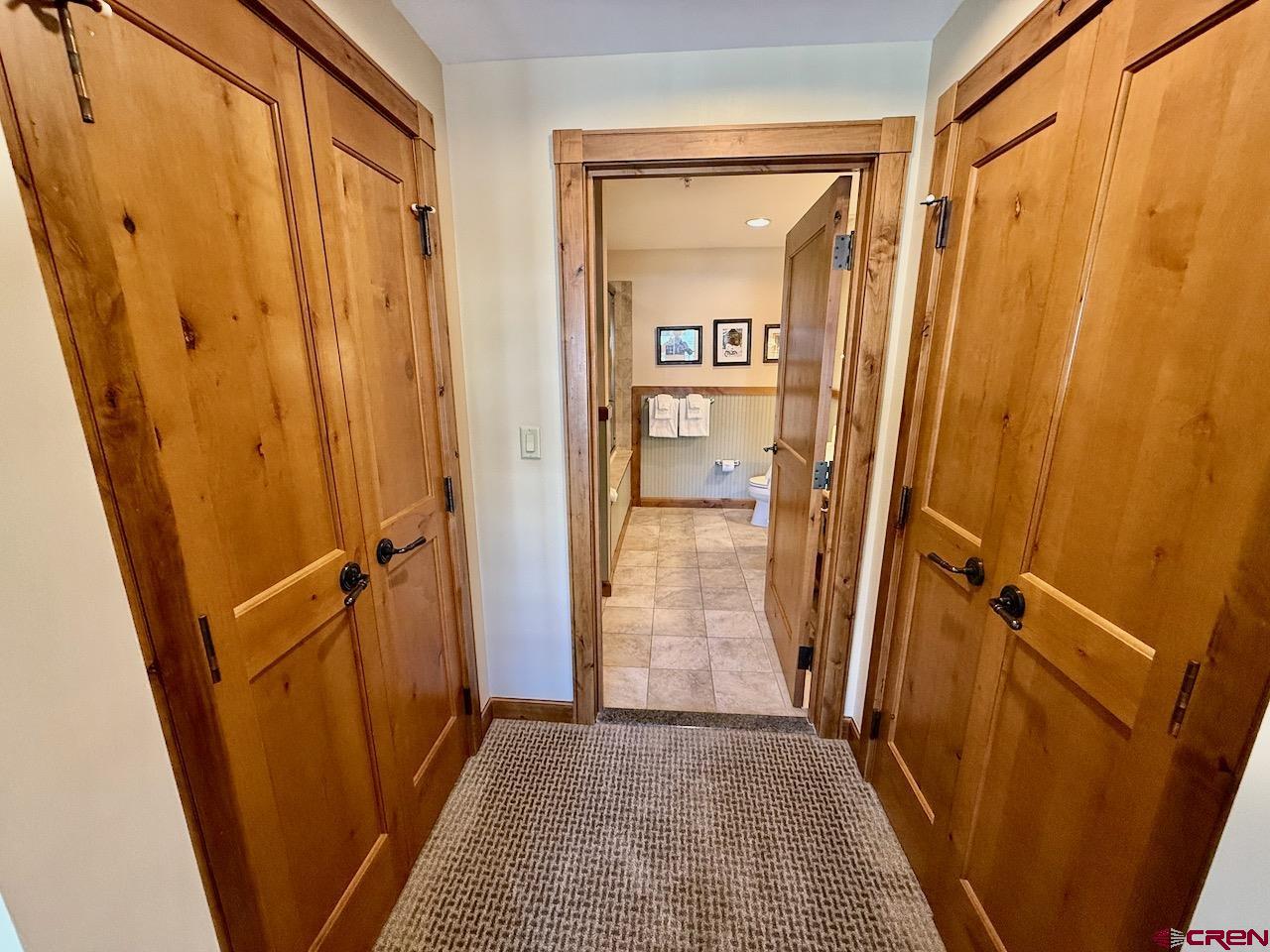 620 Gothic Road, Unit 206 Crested Butte, CO 81225 - Photo 25 of 41 an empty room with wooden floor