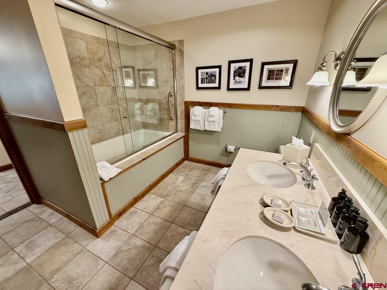 620 Gothic Road, Unit 206 Crested Butte, CO 81225 - Photo 27 of 41 a bathroom with a sink and a shower