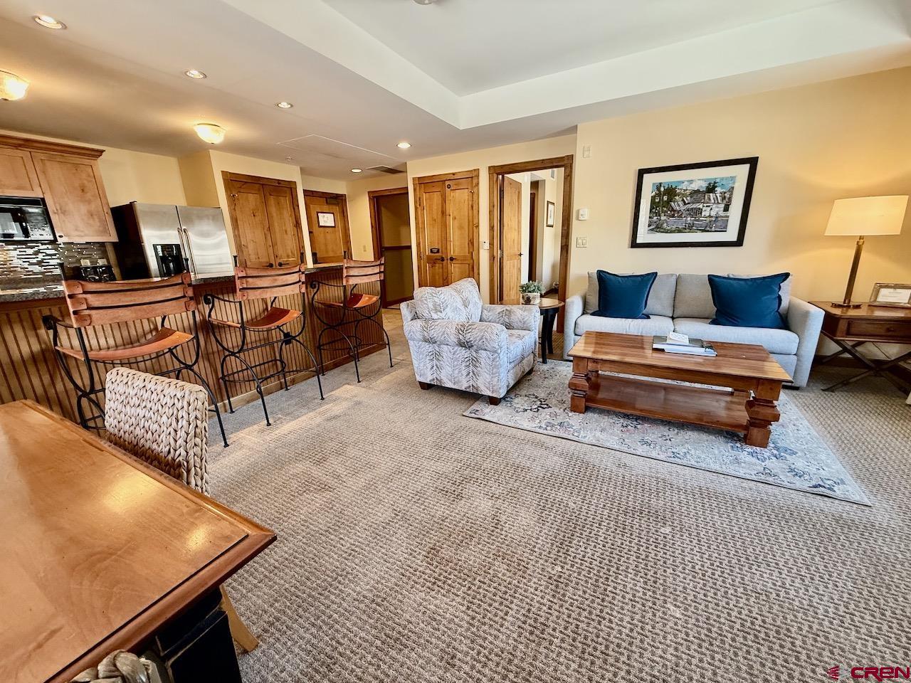 620 Gothic Road, Unit 206 Crested Butte, CO 81225 - Photo 3 of 41 a living room with furniture and a window