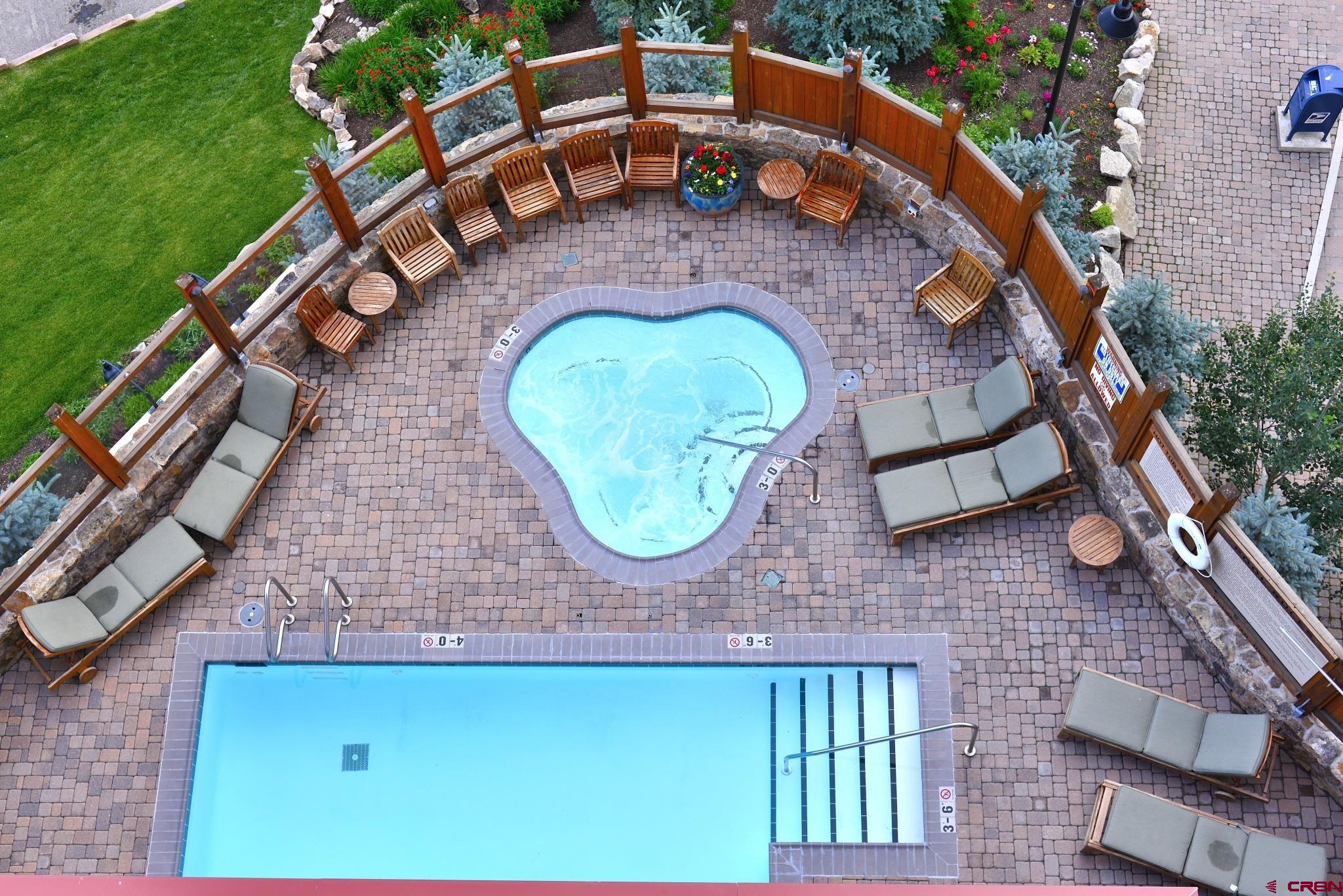 620 Gothic Road, Unit 206 Crested Butte, CO 81225 - Photo 38 of 41 an aerial view of a house with a swimming pool