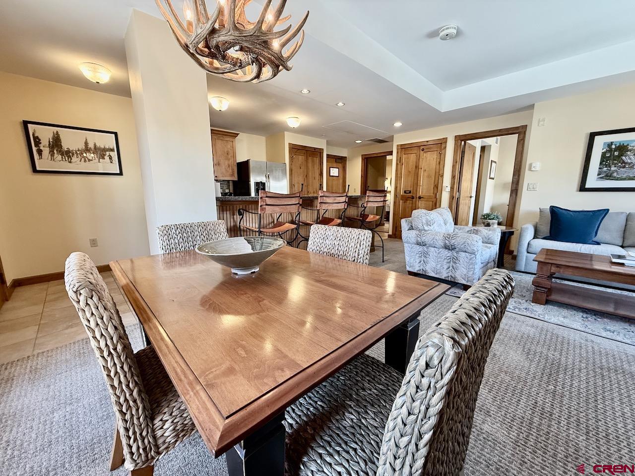 620 Gothic Road, Unit 206 Crested Butte, CO 81225 - Photo 4 of 41 a living room with furniture and wooden floor