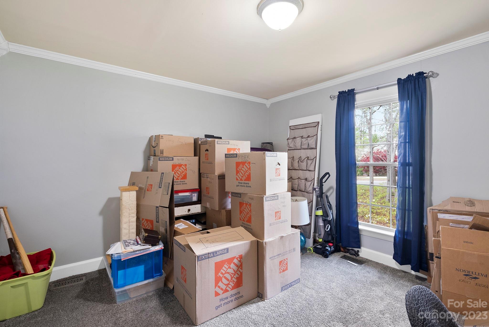 6501 Wynbrook Way Raleigh, NC 27612 - Photo 21 of 30 a view of a workspace with furniture and a window