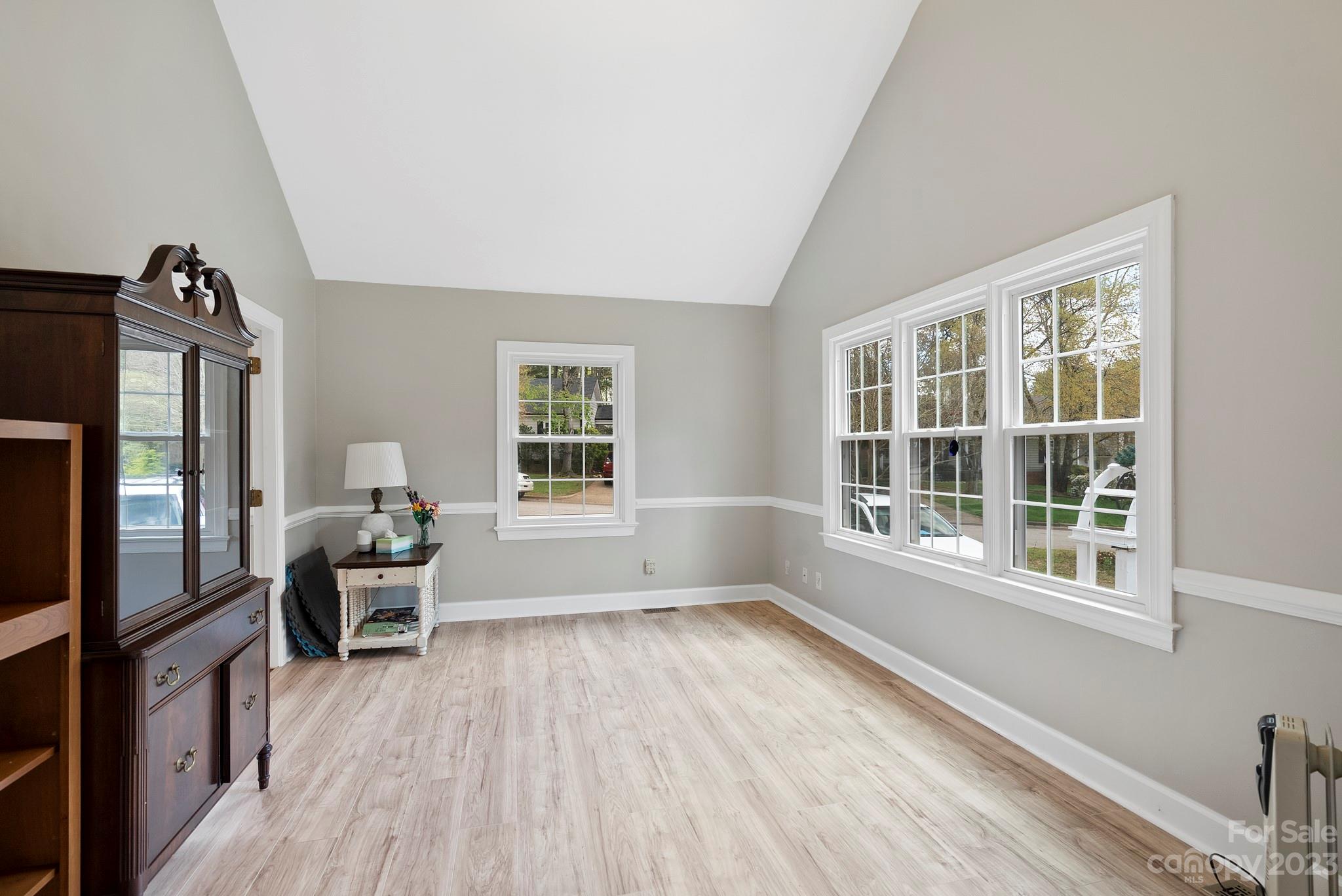 6501 Wynbrook Way Raleigh, NC 27612 - Photo 7 of 30 a living room with furniture and a window