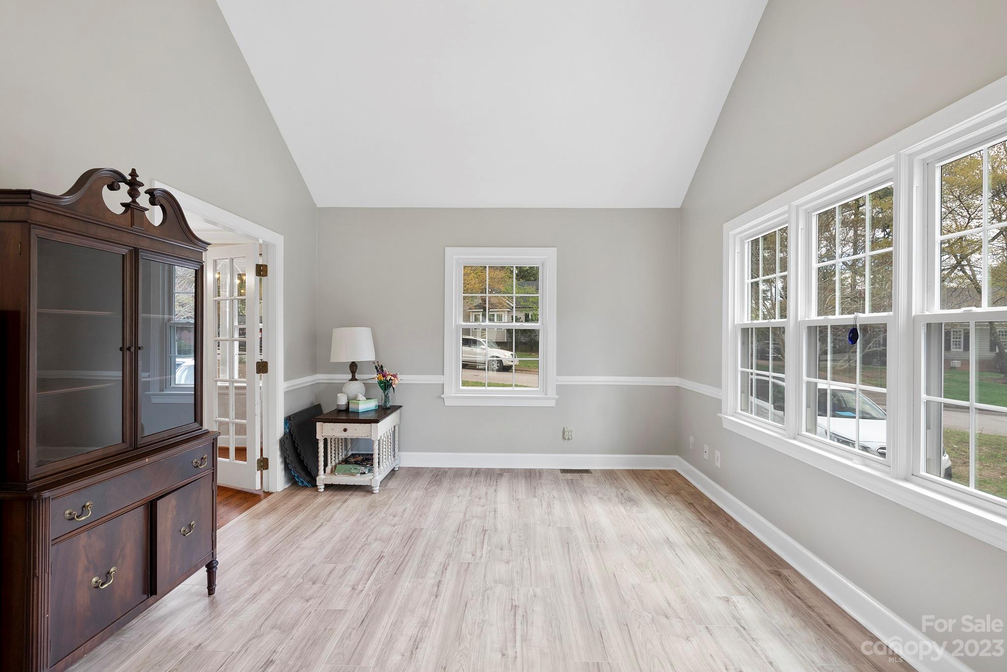 6501 Wynbrook Way Raleigh, NC 27612 - Photo 8 of 30 a view of a living room and dining room