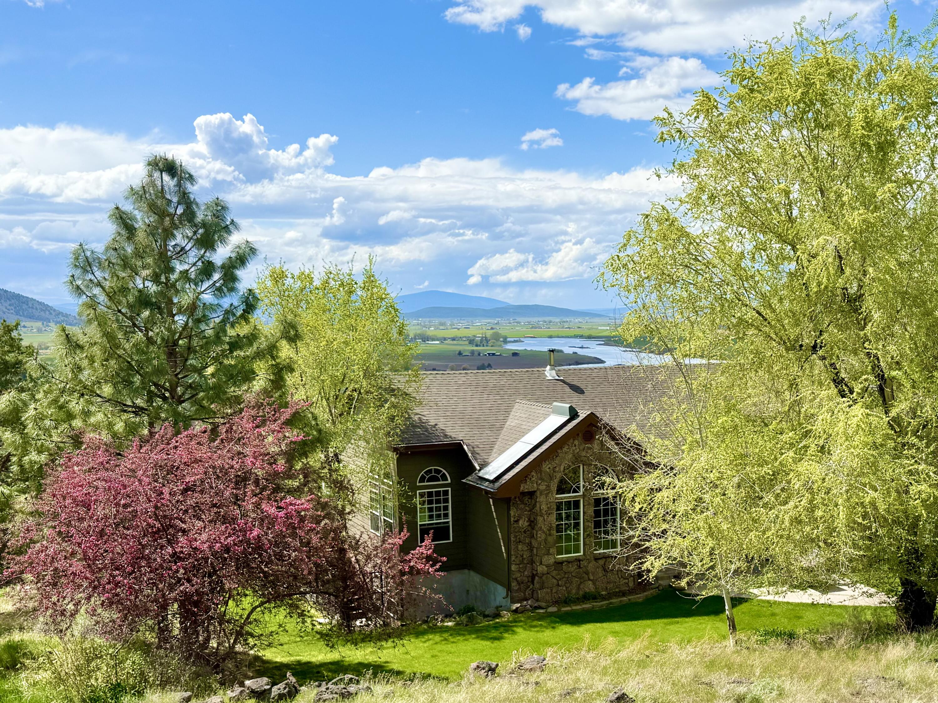 13351 Crystal Springs Road Klamath Falls, OR 97603 - Photo 3 of 51 a view of a house with a big yard plants and large trees
