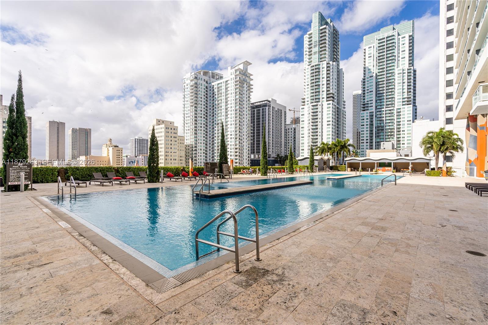 50 Biscayne Boulevard, Unit 3601 Miami, FL 33132 - Photo 40 of 83 a view of swimming pool with outdoor seating