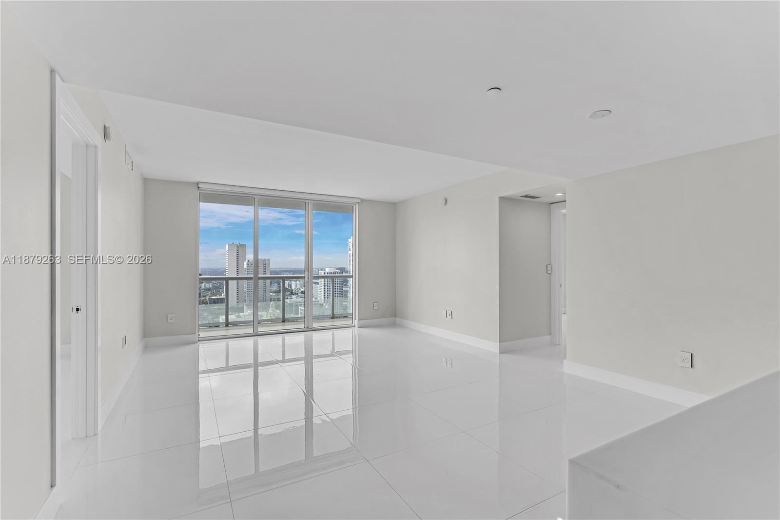 50 Biscayne Boulevard, Unit 3601 Miami, FL 33132 - Photo 5 of 83 a view of an empty room with a window