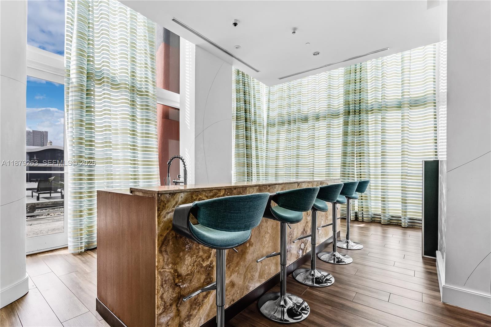 50 Biscayne Boulevard, Unit 3601 Miami, FL 33132 - Photo 73 of 83 a living room with furniture and a large window