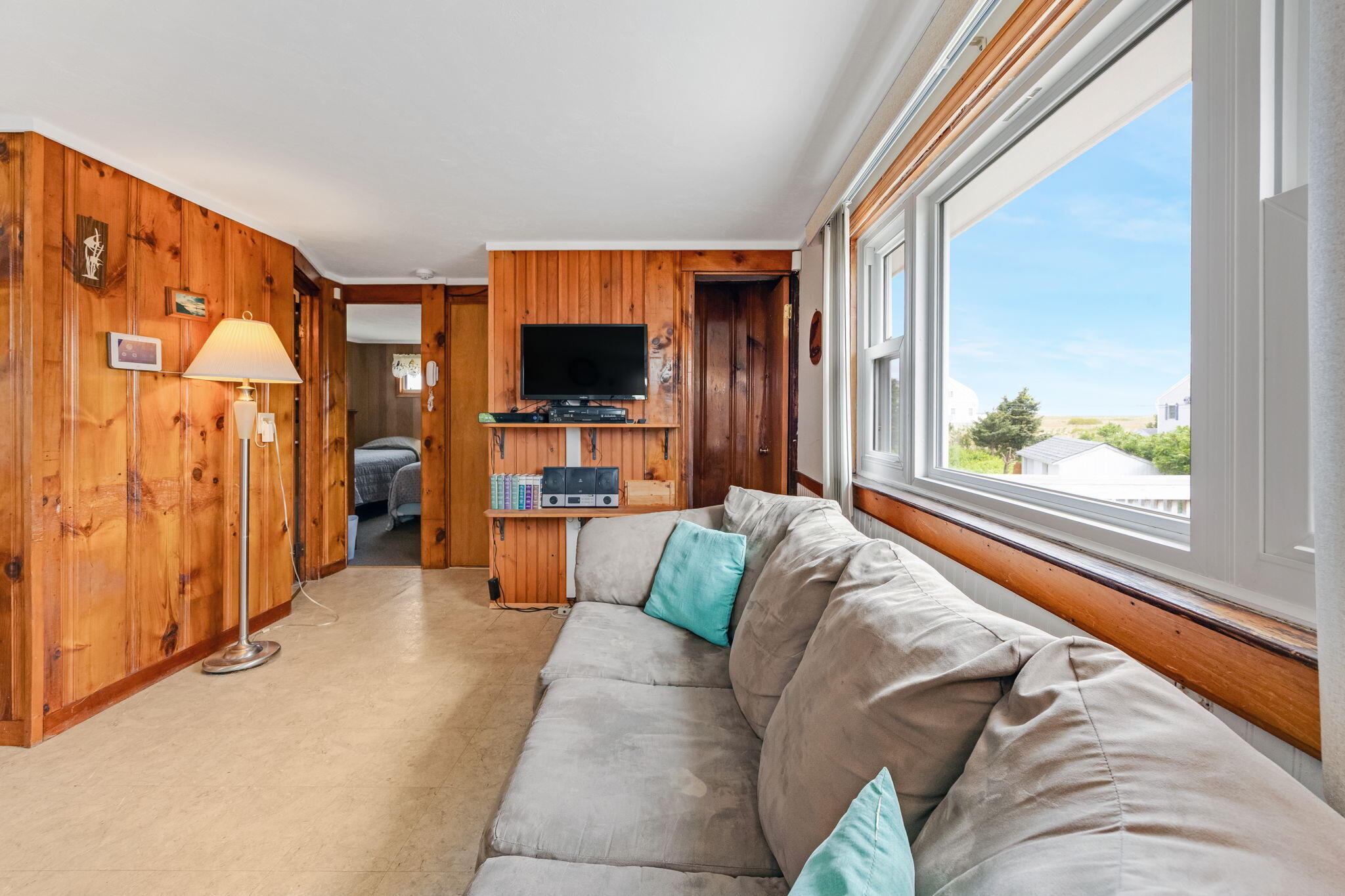 357 Phillips Road Sandwich, MA 02563 - Photo 11 of 28 a living room with furniture and a flat screen tv