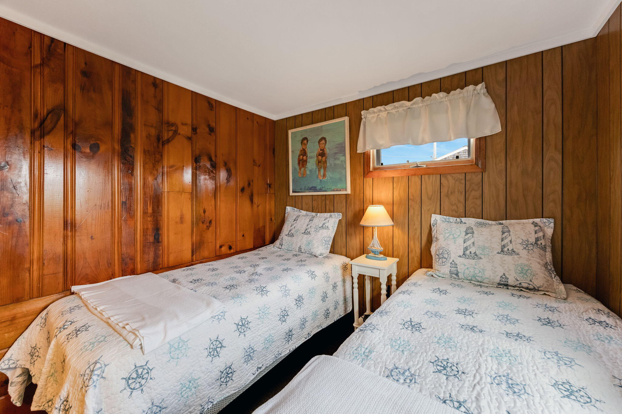 357 Phillips Road Sandwich, MA 02563 - Photo 17 of 28 a bedroom with a large bed and a window