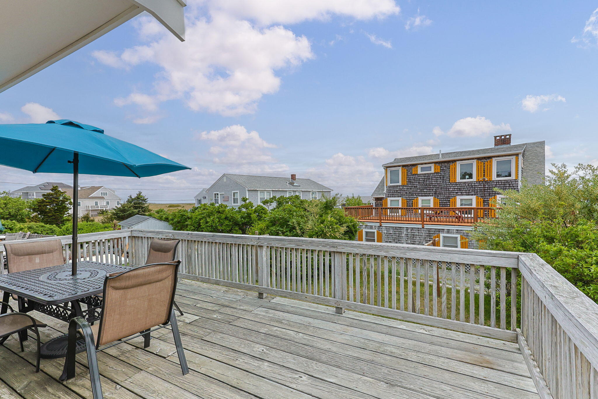 357 Phillips Road Sandwich, MA 02563 - Photo 3 of 28 a view of a chairs on the roof deck