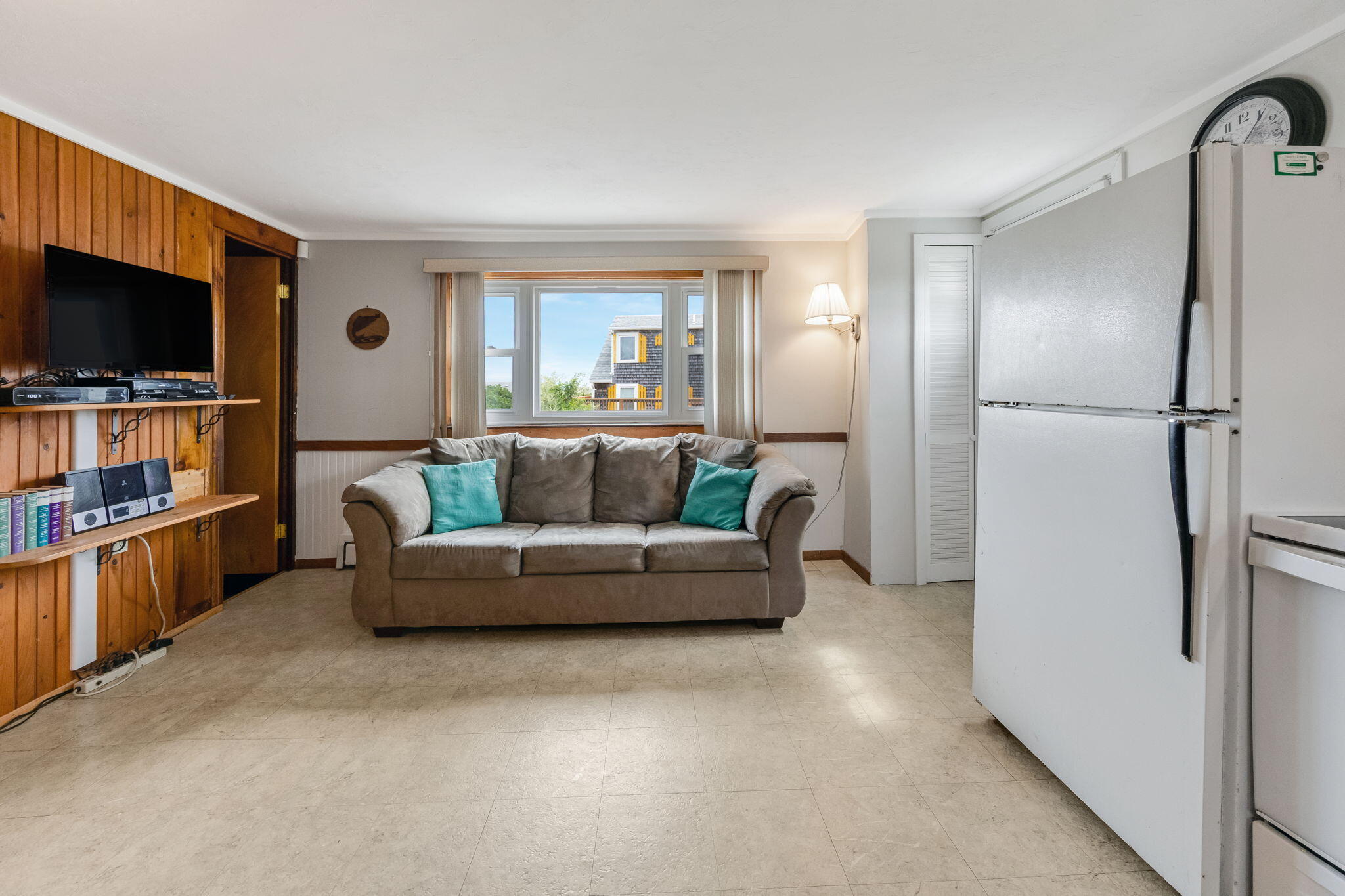 357 Phillips Road Sandwich, MA 02563 - Photo 7 of 28 a living room with furniture and a flat screen tv