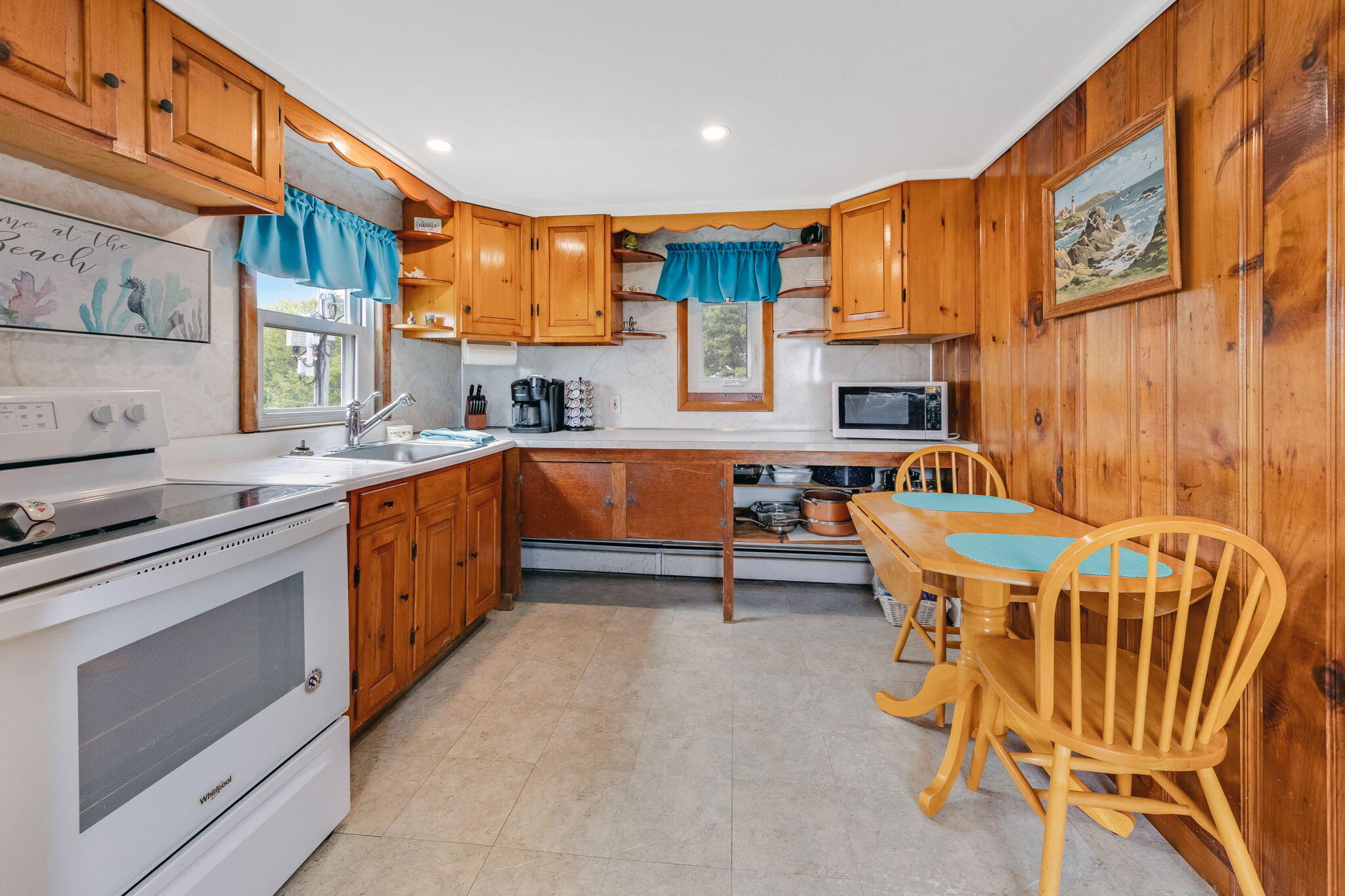 357 Phillips Road Sandwich, MA 02563 - Photo 9 of 28 a kitchen with stainless steel appliances granite countertop a sink a stove and a refrigerator