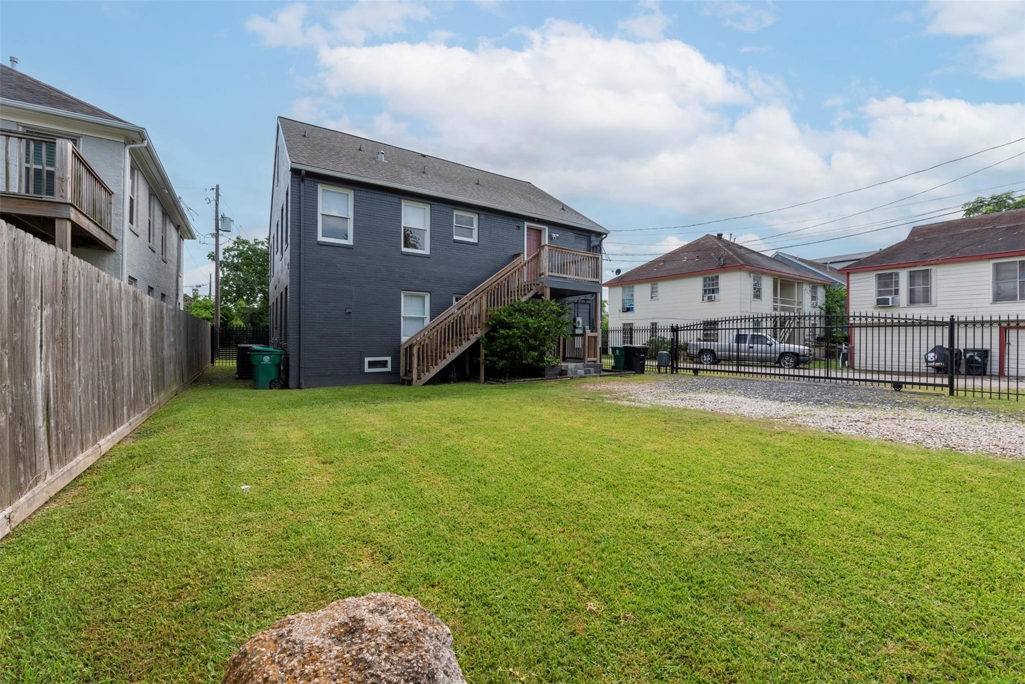 2903 Wichita Street, Unit 1 Houston, TX 77004 - Photo 18 of 19 a view of a house with a backyard