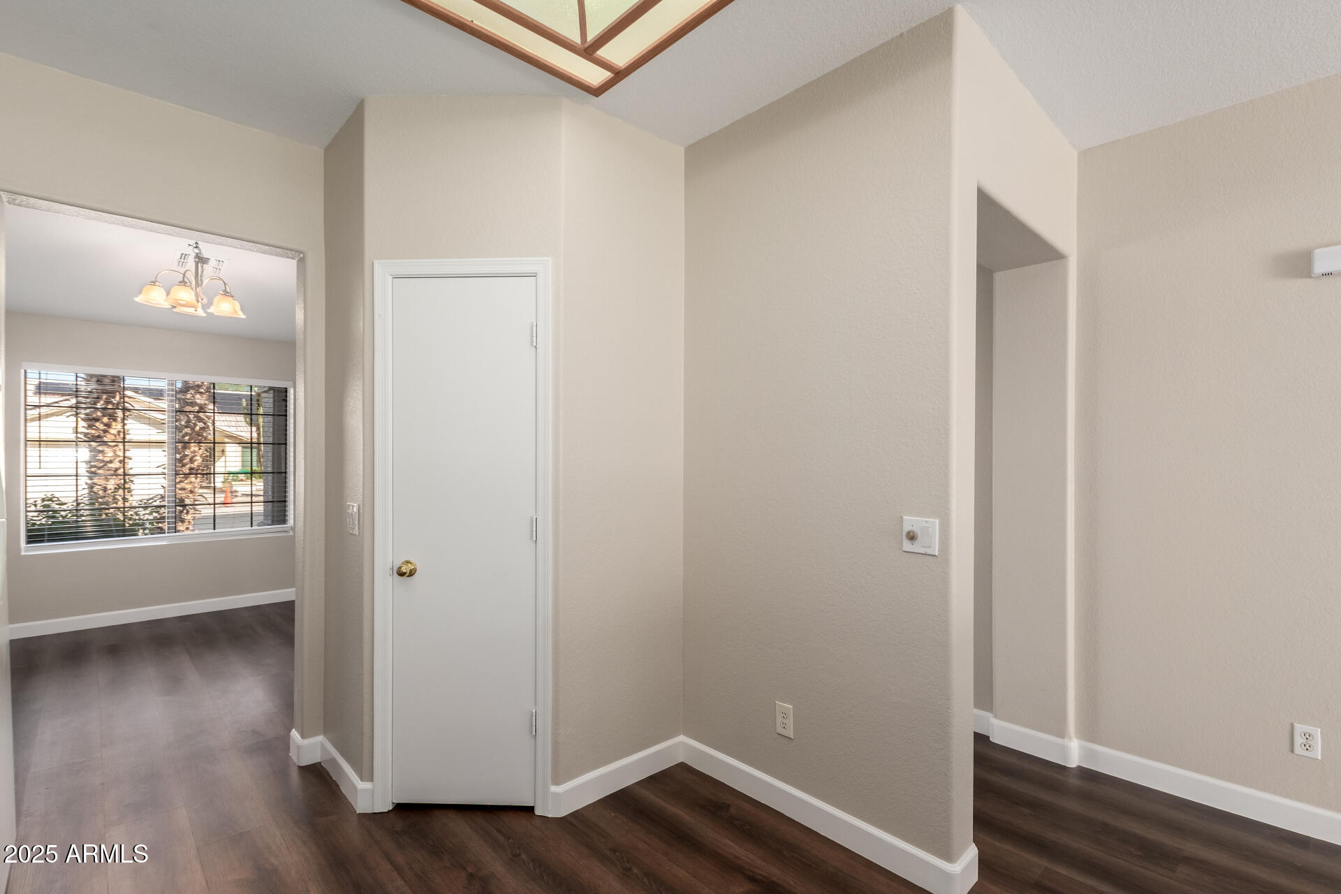 501 West Mesquite Street Gilbert, AZ 85233 - Photo 12 of 24 an empty room with wooden floor and windows