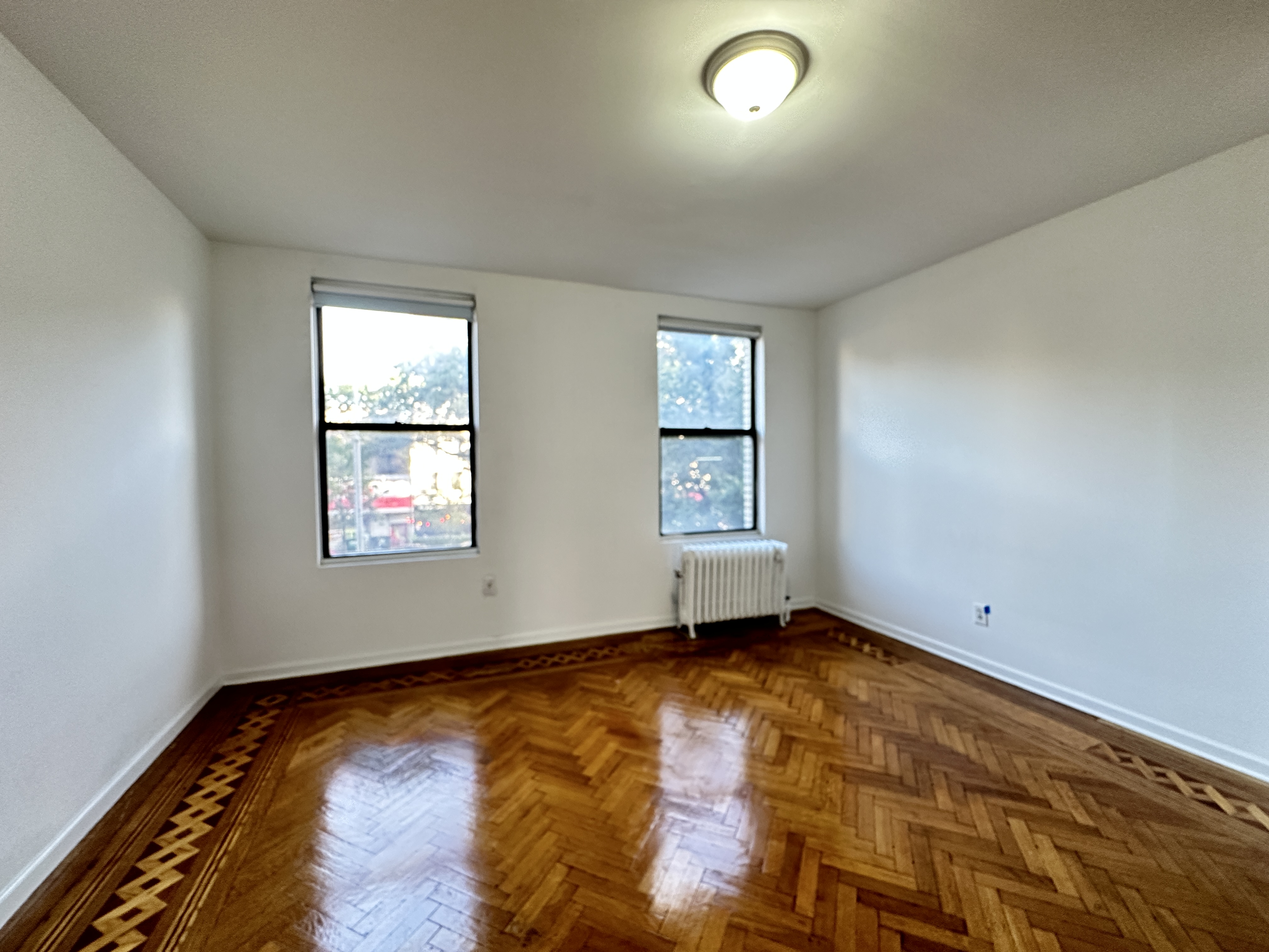 601 West 149th Street, Unit 35 Manhattan, NY 10031 - Photo 2 of 9 an empty room with windows
