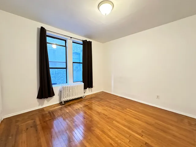 an empty room with window