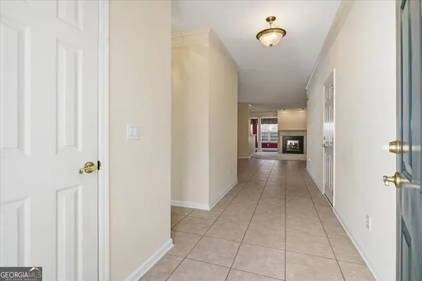 a view of a hallway view with living room
