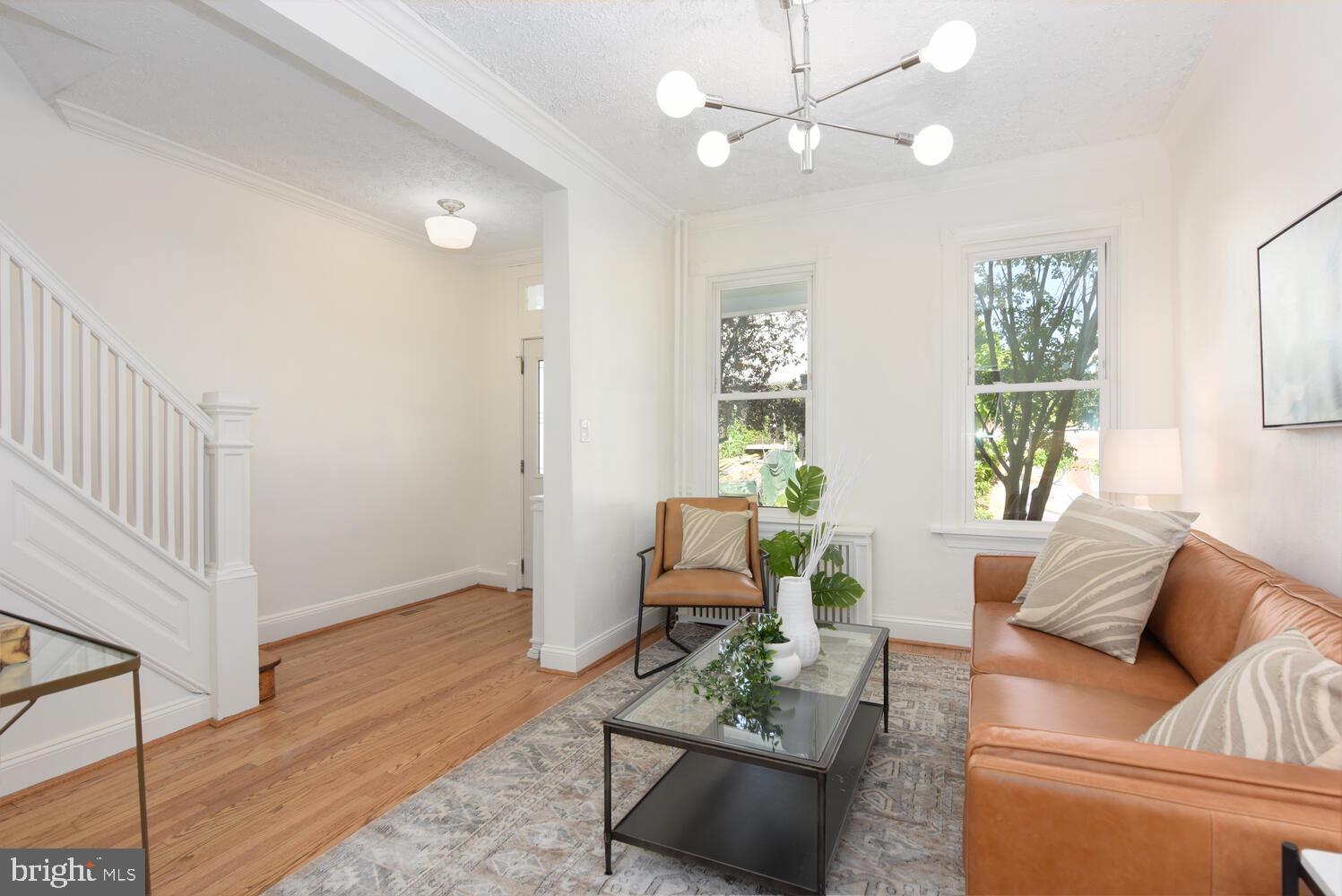 754 Columbia Road Northwest Washington, DC 20001 - Photo 3 of 34 Inviting Entry Foyer w Recently Refinished Floors
