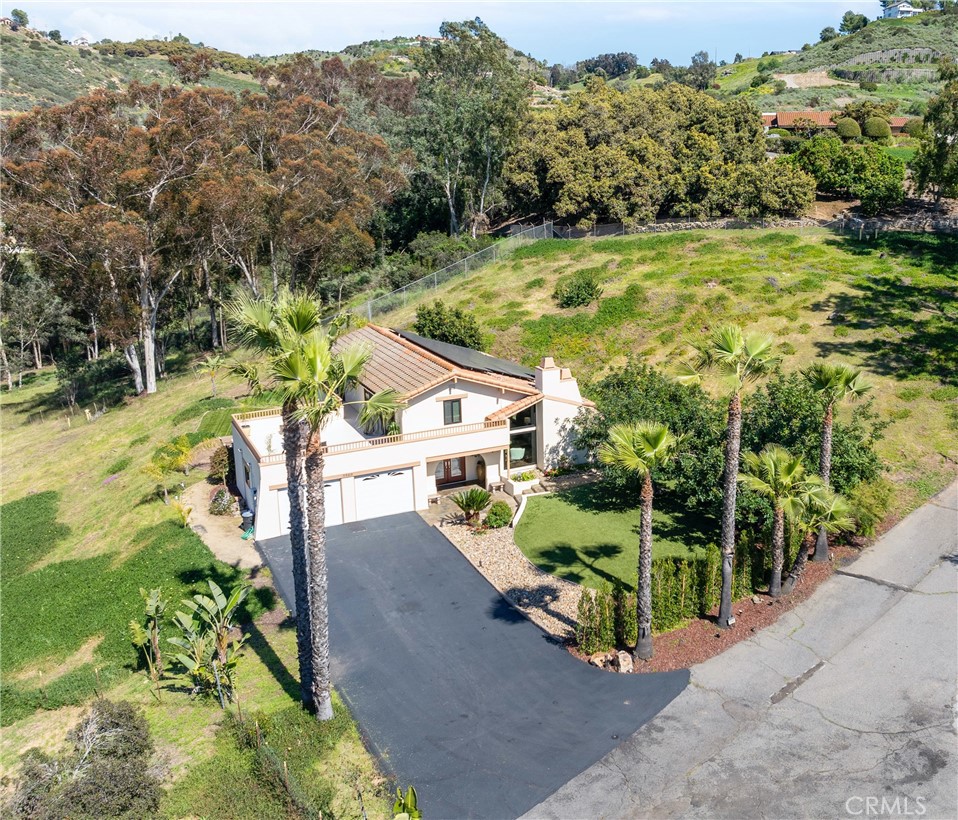 3560 Gopher Canyon Road Vista, CA 92084 - Photo 1 of 1 a view of a garden with an outdoor seating