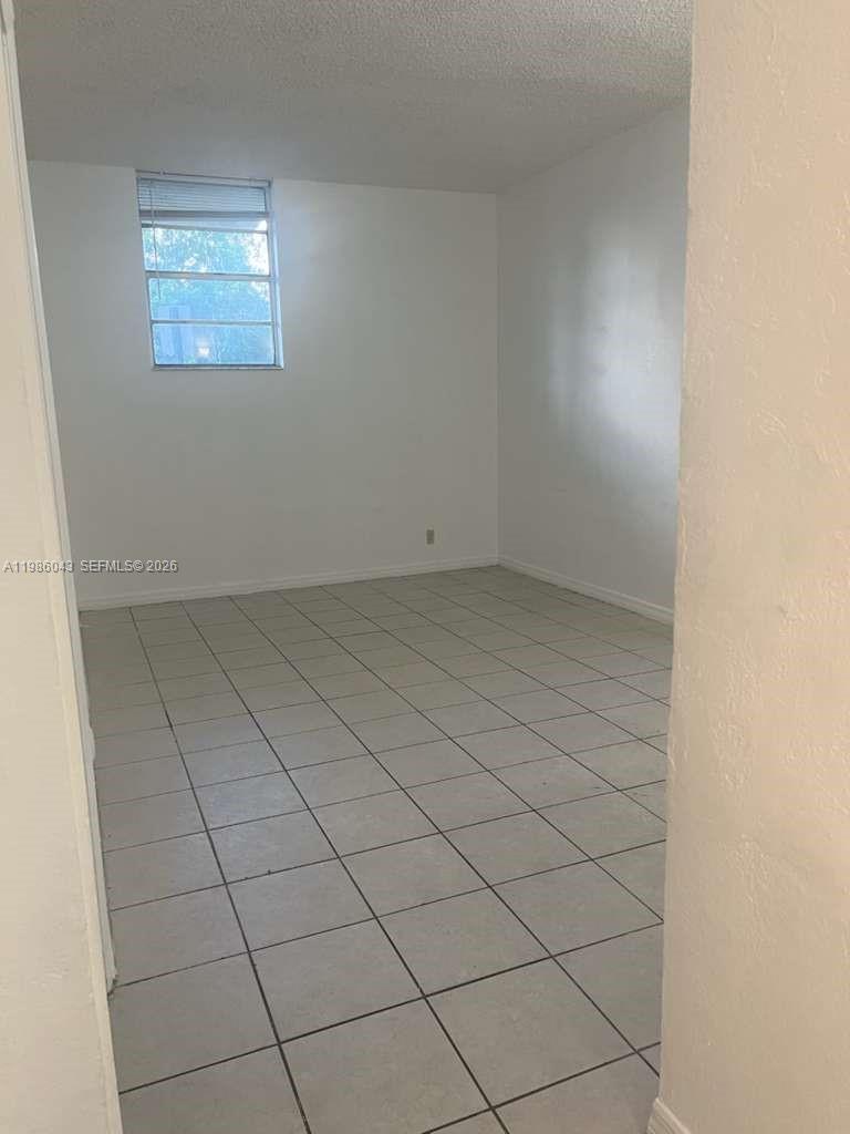 4550 Northwest 9th Street, Unit 114E Miami, FL 33126 - Photo 4 of 9