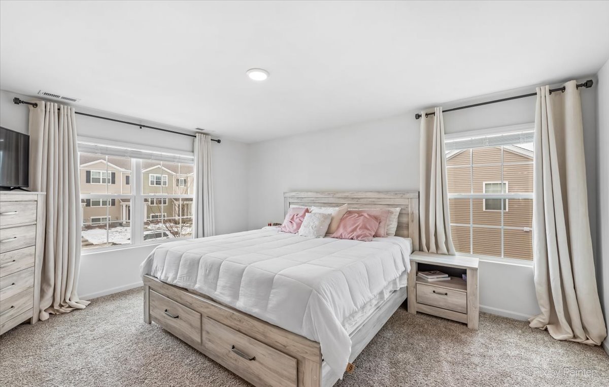 2340 Upland Road Pingree Grove, IL 60140 - Photo 10 of 29 a bedroom with a bed and a window