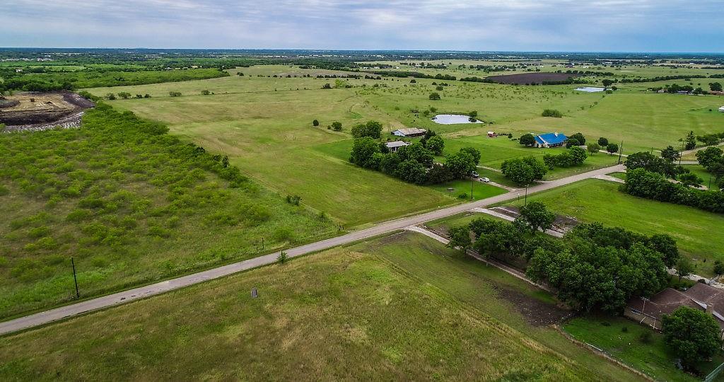225 Valek Road Ennis, TX 75119 - Photo 3 of 8 a view of an outdoor space and a lake view