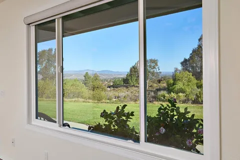 a view of a glass door and from a window
