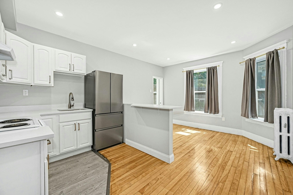 34 William Street Worcester, MA 01609 - Photo 24 of 41 a kitchen with a refrigerator sink and stove